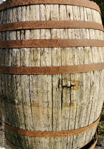 image of classic old holey wooden barrel