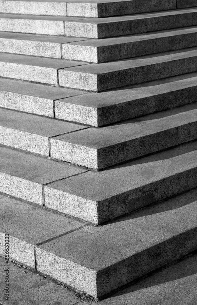 Wide, abstract, geometric fine art photography shots of granite, stone, or cement stairs and steps in black and white from city monuments and landmarks. Wide, abstract, geometric fine art photography shots of granite, stone, or cement stairs and steps in black and white from city monuments and landmarks.