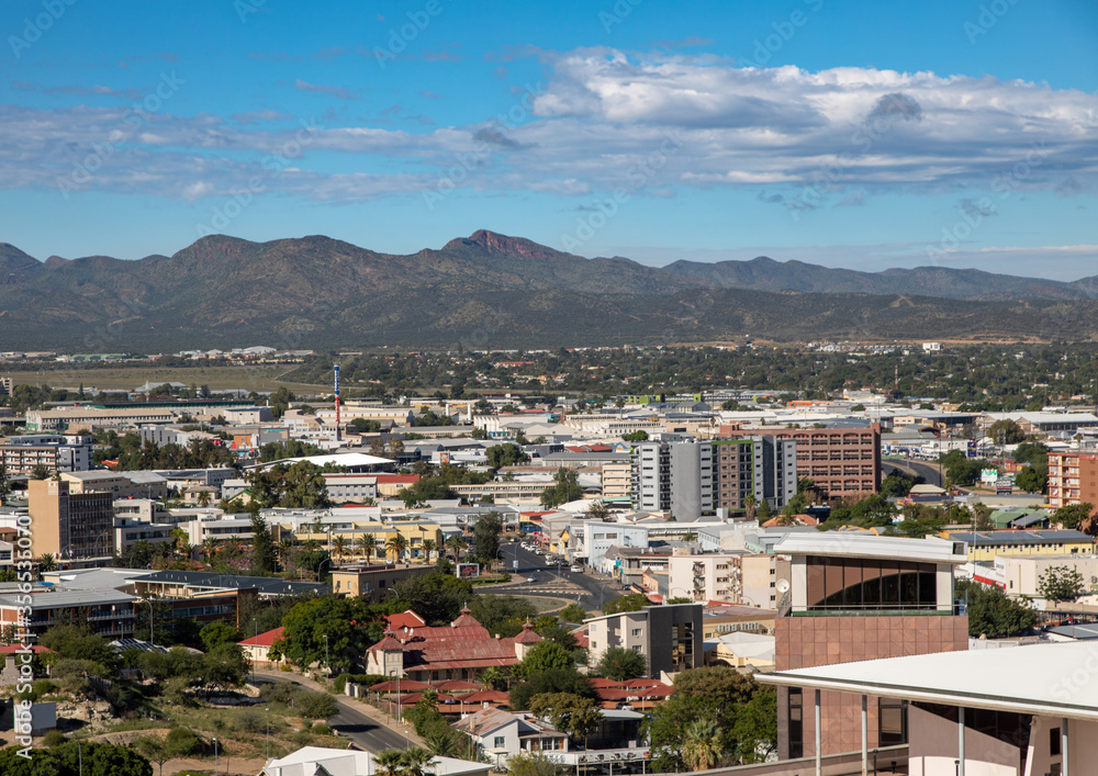Skyline of Namibia's capital Windhoek with a cloudy sky