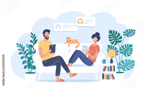 Young couple spend time at home work online