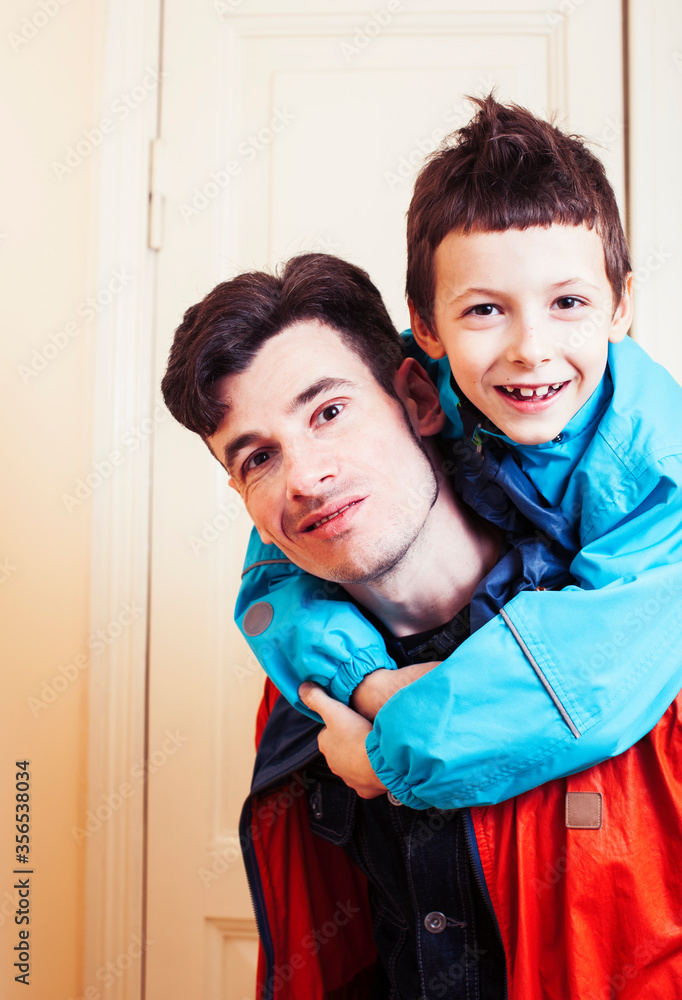 Obraz premium faher and son together having fun at home, lifestyle happy family, people at home