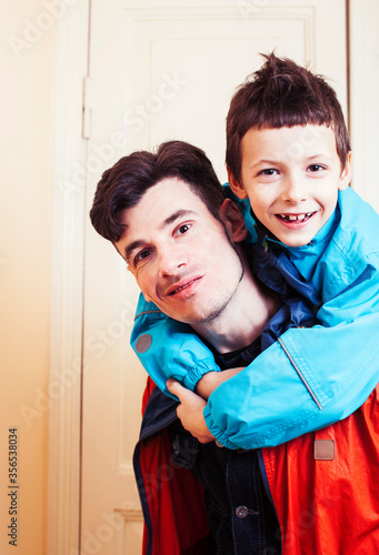 faher and son together having fun at home, lifestyle happy family, people at home photo