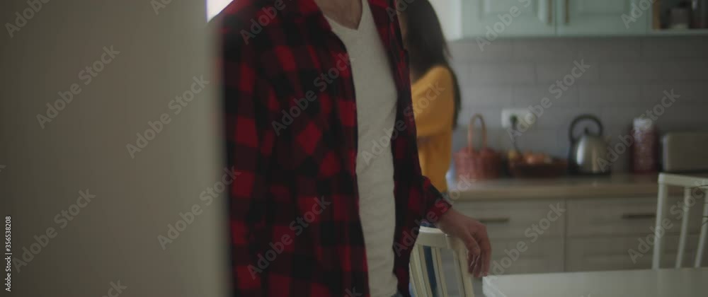 Couple feeling upset and hurt after having a big fight in the kitchen at home. Breaking up, cheating, jealousy, divorce concept. Shallow DOF, Slow motion, BMPCC 4K