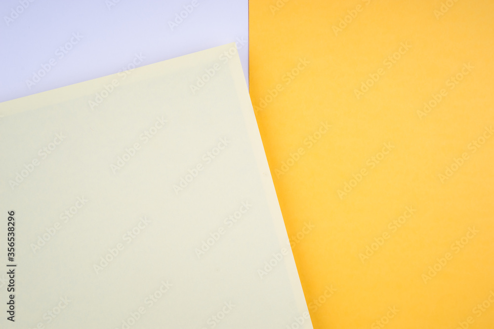 Creative arrangement of soft pastel colored papers creating an abstract background Creative arrangement of soft pastel colored papers creating an abstract background