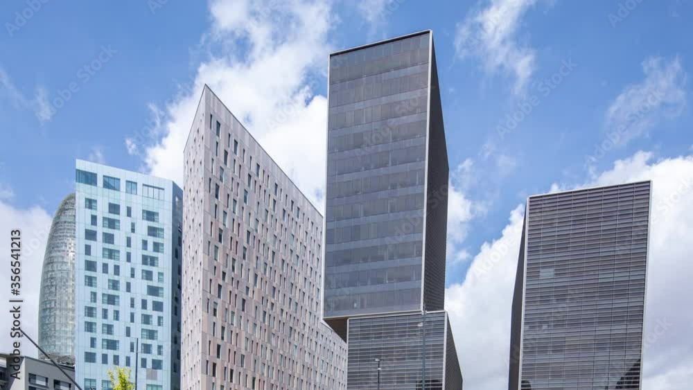 Video of skyscrapers with clouds in sky, Barcelona, Spain Video of skyscrapers with clouds in sky, Barcelona, Spain