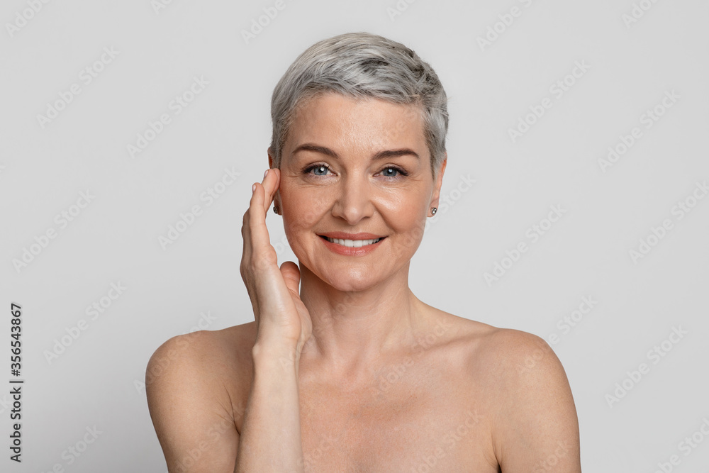1000px x 667px - Anti-Age Treatment. Portrait Of Attractive Nude Mature Woman With Beautiful  Skin Stock Photo | Adobe Stock
