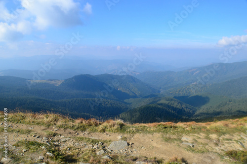 Beautiful view of landscape of mountains, forest and meadows in the Carpathians in sunny weather
