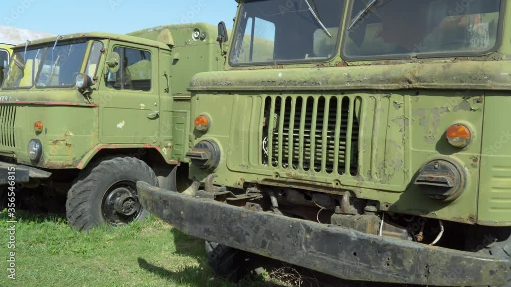 The display of the old military trucks on the garage