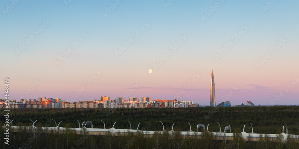 Obraz premium Morning city landscape on the outskirts of St. Petersburg. Beautiful dawn scene in the city