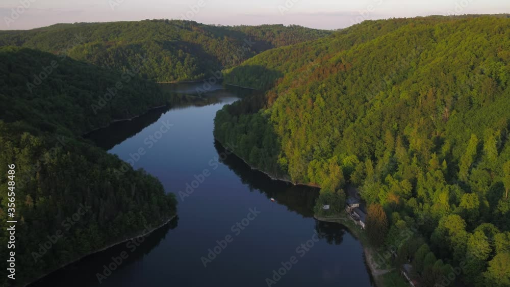 Lake in the mountains with forests Lake in the mountains with forests