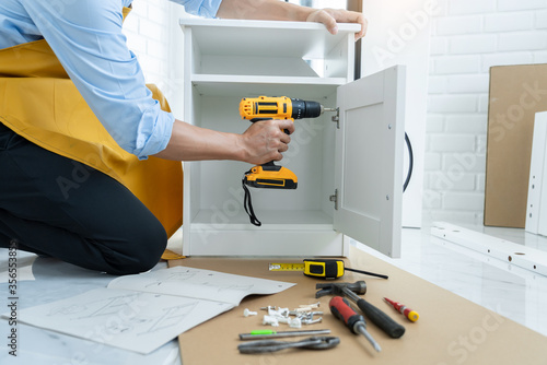 Wallpaper Mural worker with drill Torontodigital.ca