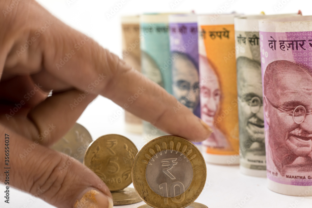 Fototapeta premium Indian coins and papaer currency in display