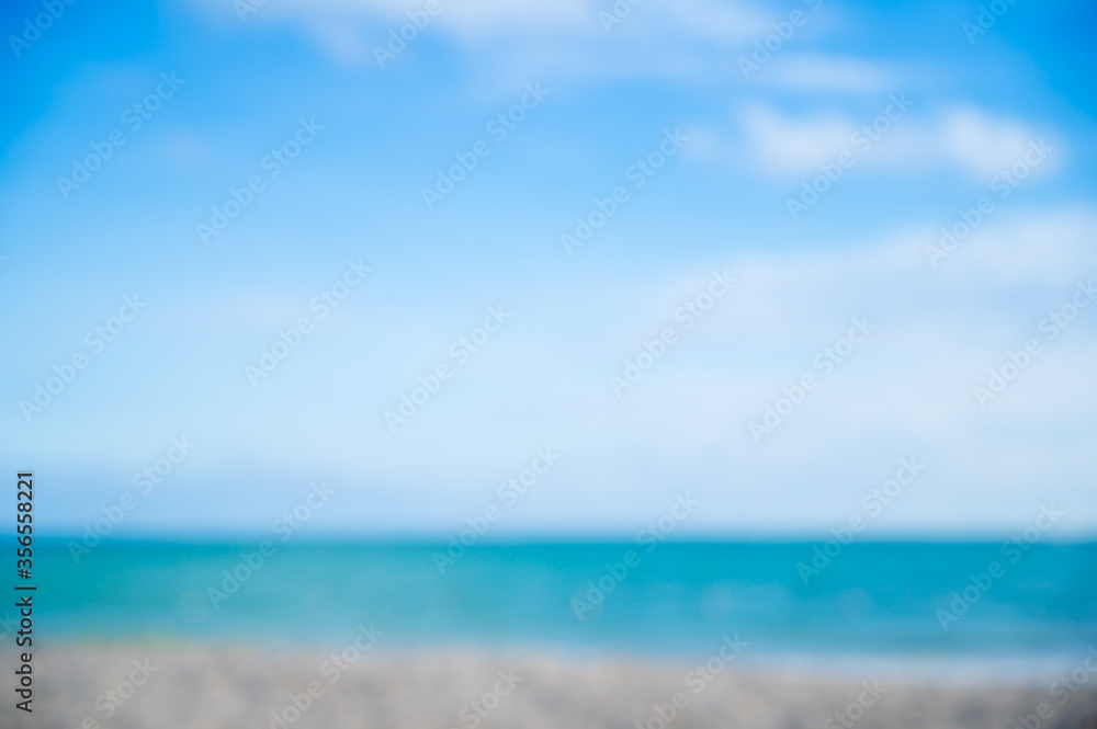 Fototapeta premium tropical beach and blue sky blur image for background.