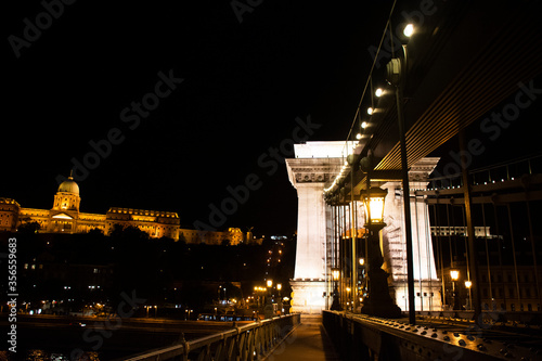 View landscape and cityscape of Old town city and Hungarian Parliament with Danube Delta river and Buda Chain Bridge in night time in Budapest, Hungary