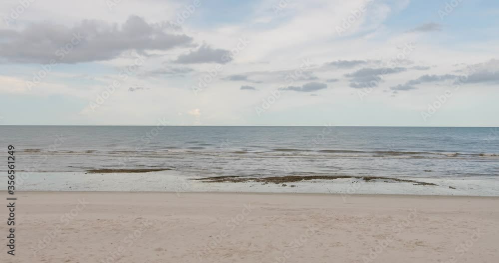 Hua Hin beach, View of beach sea on cloudy day. At Hua Hin Beach, Prachuap Khiri Khan, Thailand. 4K Hua Hin beach, View of beach sea on cloudy day. At Hua Hin Beach, Prachuap Khiri Khan, Thailand. 4K