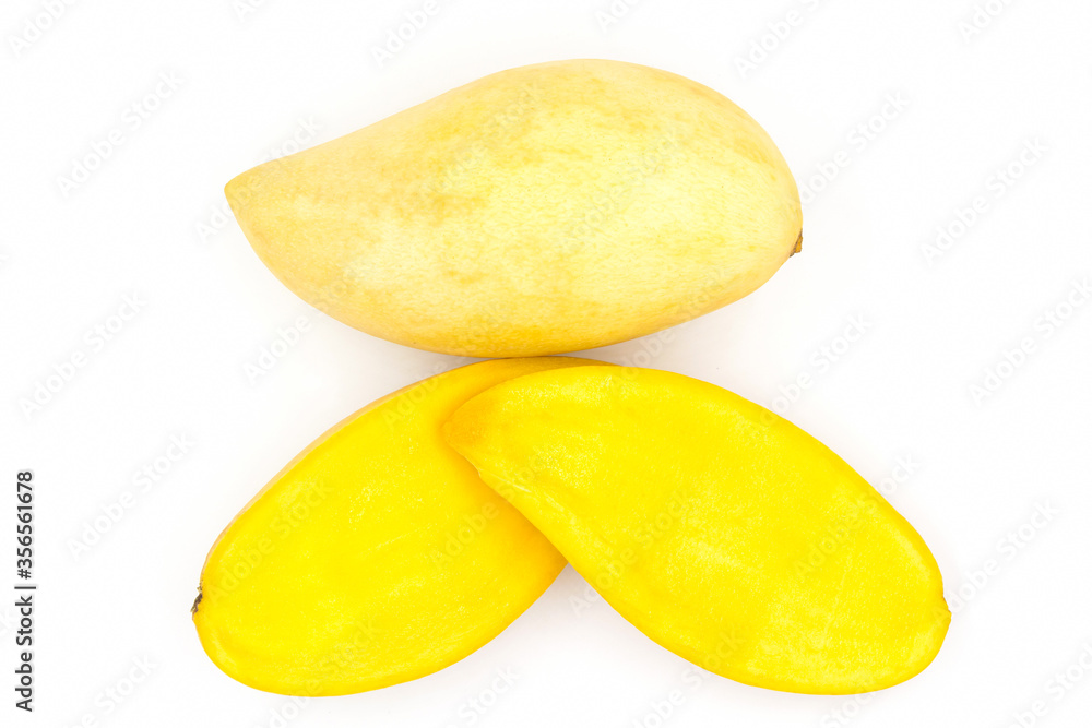 Ripe yellow mango fruit (Barracuda mango) with sliced top view isolated on white background Ripe yellow mango fruit (Barracuda mango) with sliced top view isolated on white background