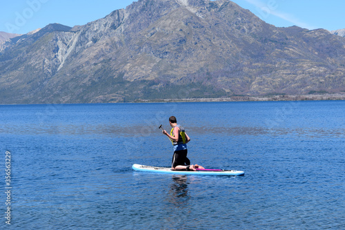 young man kayaking in the lake