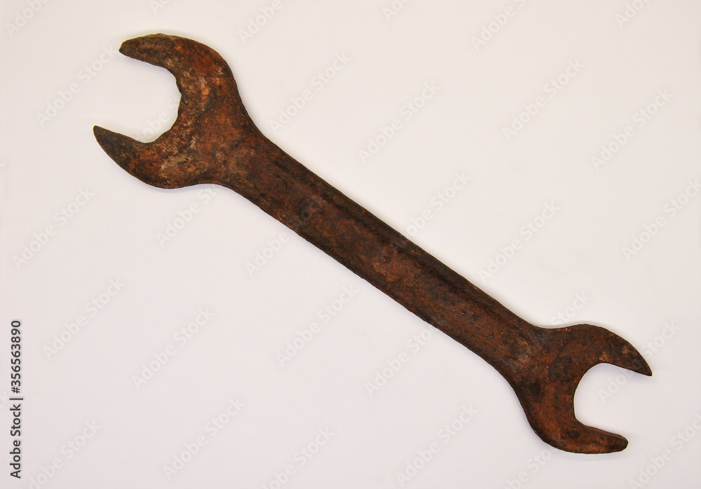 old rusty spanner. old rusty wrench. view from above old rusty spanner. old rusty wrench. view from above