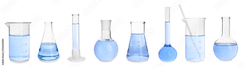 Set of laboratory glassware on white background