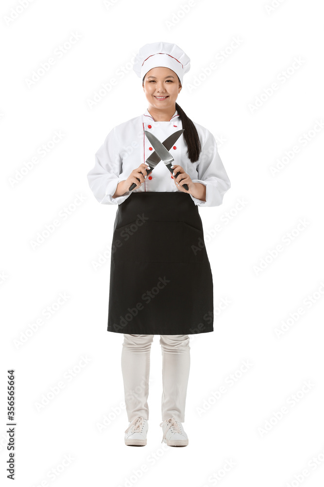 Beautiful Asian chef with knives on white background Beautiful Asian chef with knives on white background
