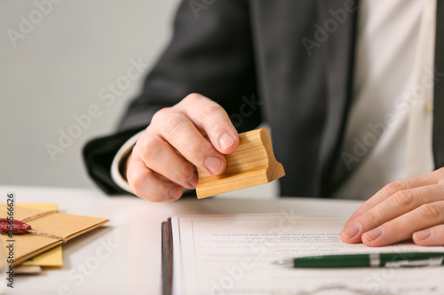 Notary public with stamp wo...