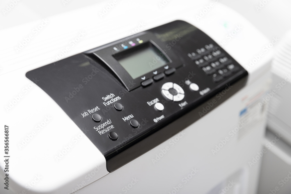 Close up of printer or photocopier control panel, selective focus Close up of printer or photocopier control panel, selective focus