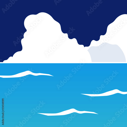 青い空と青い海の境界にある入道雲