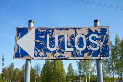 weathered parking lot sign, Finland