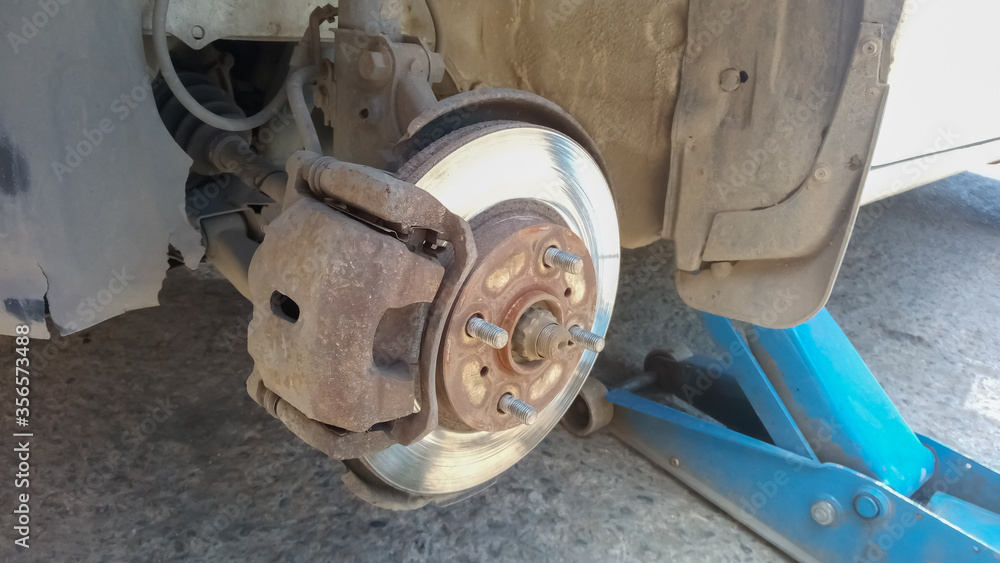 Fototapeta premium Seasonal wheel change in tire repair