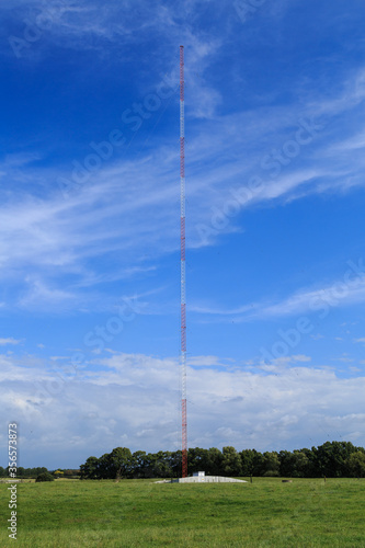 An AM radio transmitter tower soaring high into the sky