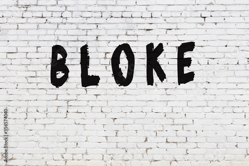 Word bloke painted on white brick wall