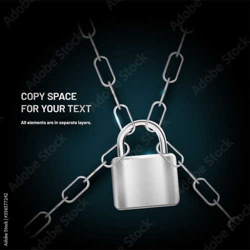 Shiny metal chains with lock on dark background