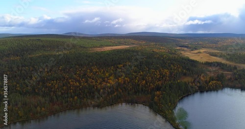 Aerial view of the Pallas-Yllästunturi National Park in Finnish Lapland, on a cloudy fall day at the time of the ruska autumn color season photo