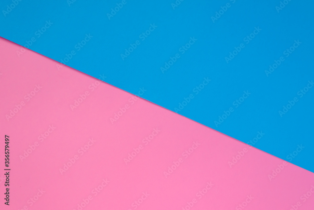 Two tone blue and pink color paper. empty space for background design. Two tone blue and pink color paper. empty space for background design.