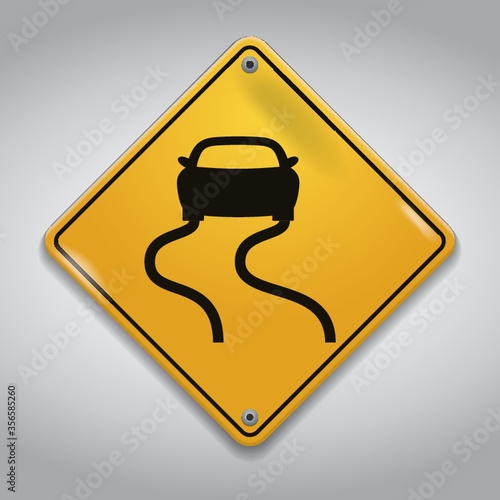 slippery road sign