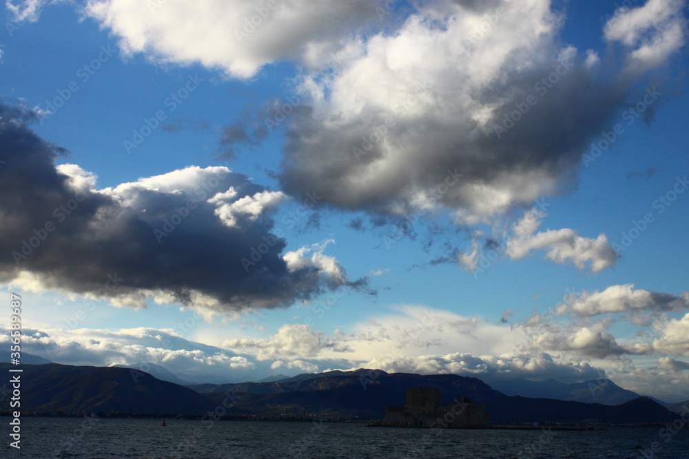 A sky full of clouds over the sea A sky full of clouds over the sea