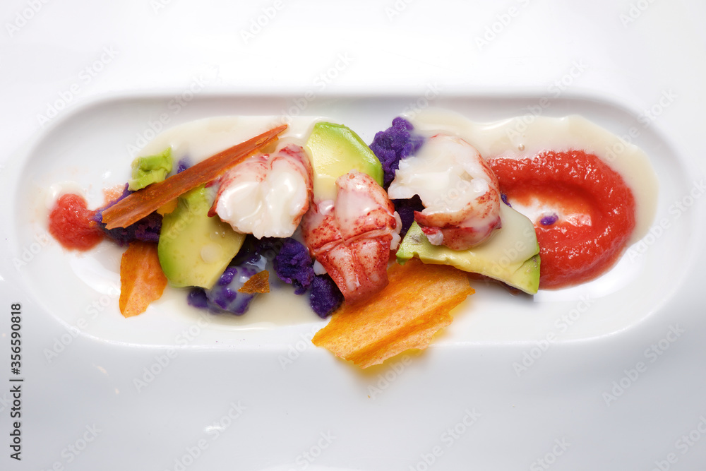 Lobster with sauce and vegetables Lobster with sauce and vegetables