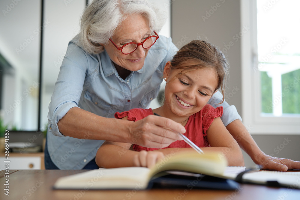 grandmother helping grandkid with homework grandmother helping grandkid with homework