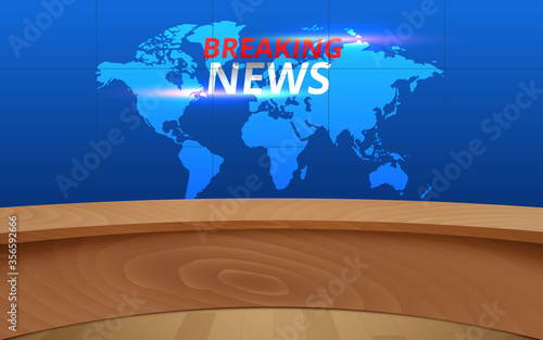 wooden table and breaking news on  lcds background in the news studio room	