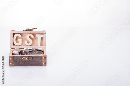 A chest with GST words isolated over white