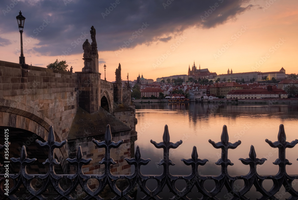 Evening view on Prague Castle with Charles Bridge after the sunset