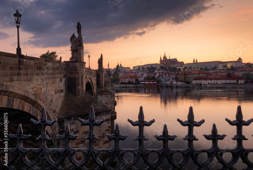 Evening view on Prague Castle with Charles Bridge after the sunset