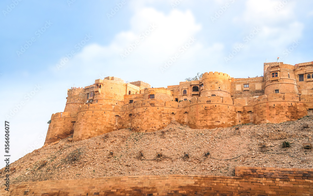 JAISALMER, INDIA - February 23 2020: Outside Jaisalmer fort yellow sandstone architecture desert city in Jaisalmer or golden city Rajasthan, India JAISALMER, INDIA - February 23 2020: Outside Jaisalmer fort yellow sandstone architecture desert city in Jaisalmer or golden city Rajasthan, India