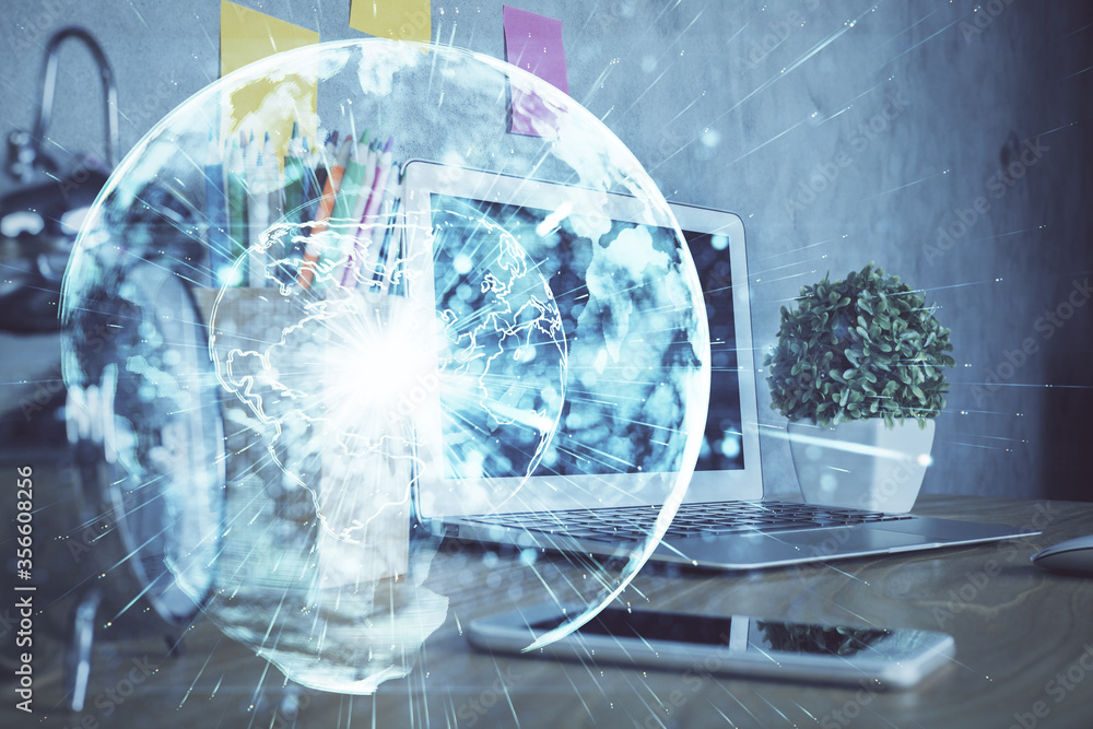 Double exposure of business theme icons and work space with computer background. Concept of success. Double exposure of business theme icons and work space with computer background. Concept of success.