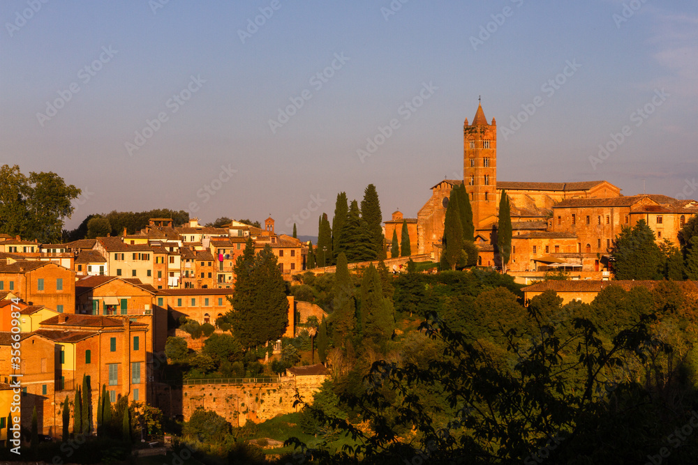 Fototapeta premium views of old siena italy at sunset