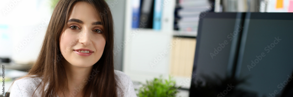 Portrait of smiling businesslady writing possible future plans. Cute businesswoman breaking off for lunch on job. Business and art design concept. Blurred background Portrait of smiling businesslady writing possible future plans. Cute businesswoman breaking off for lunch on job. Business and art design concept. Blurred background