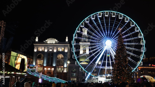 Ukraine, Kiev - January 15, 2019. Illuminated Ferris Wheel on Kontraktova Square in Kiev in the evening.