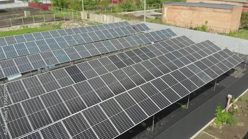 Wallpaper Mural Sun solar panels electricity sustainability of planet. Green energy for home. Solar cells power plant business. Ecological clean energy. Blue panels on the ground. Torontodigital.ca