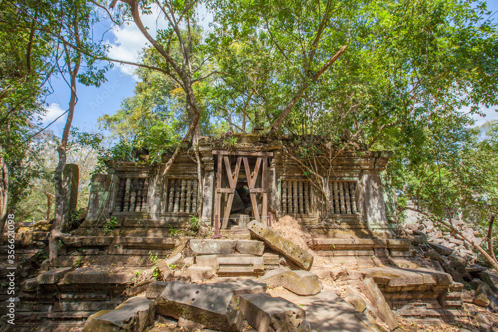 Beng Mealea Temple is a temple in the Angkor Wat style located east of the main group of temples at Angkor, Siem Reap, Cambodia. Beng Mealea Temple is a temple in the Angkor Wat style located east of the main group of temples at Angkor, Siem Reap, Cambodia.
