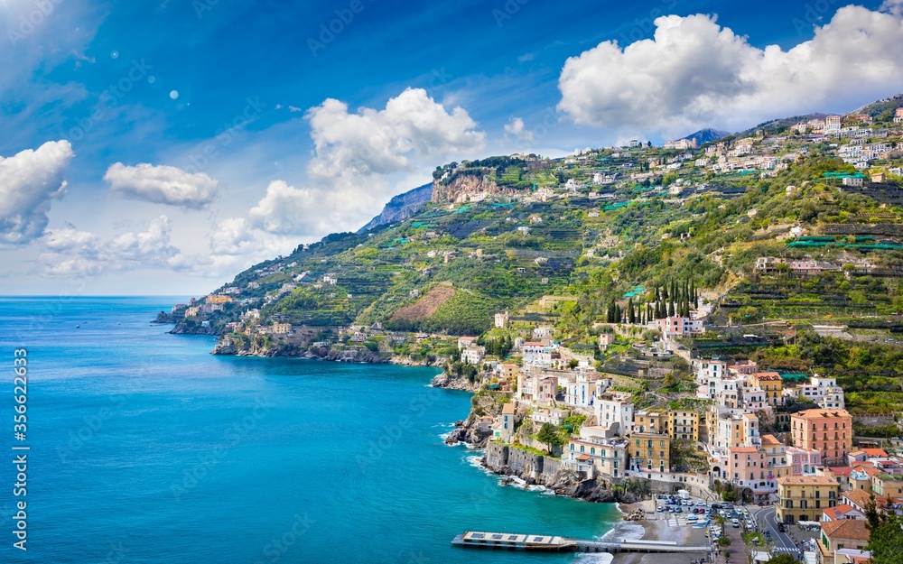 Blue sea and marina in Minori, attractive seaside town at Amalfi Coast, in Campania region of Italy.